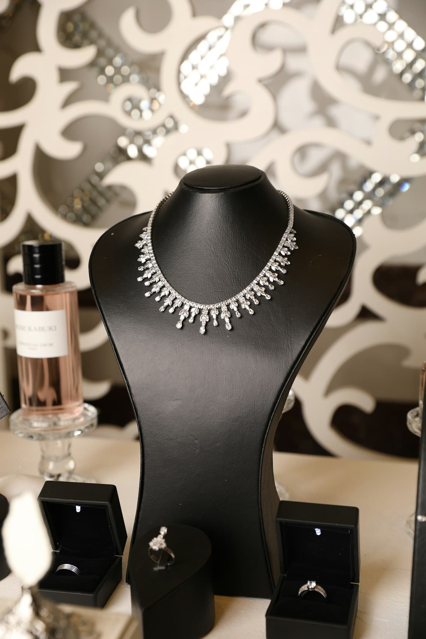 Tennis necklace on a display bust