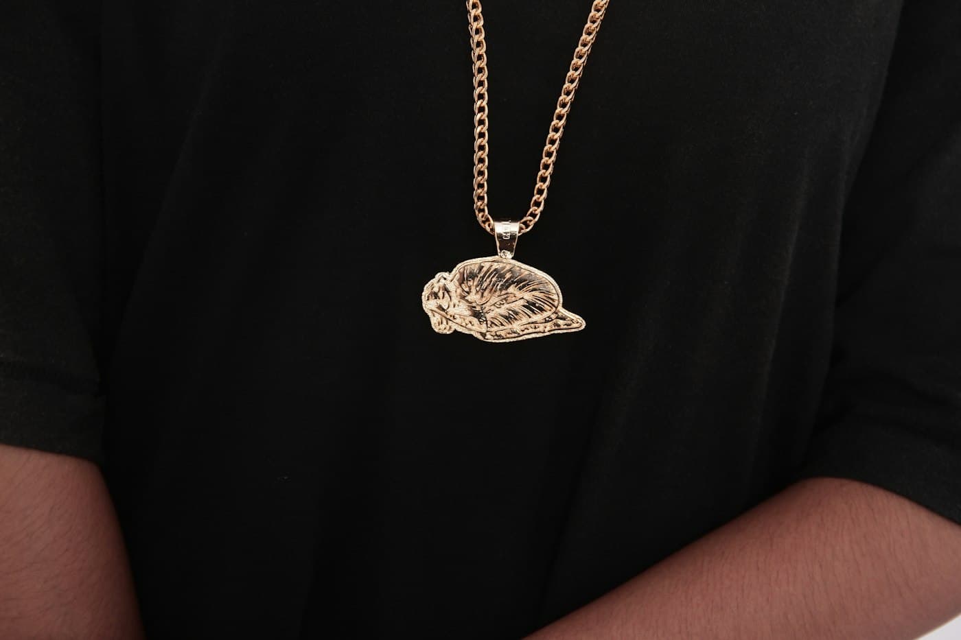 Custom gold pendant on a chain