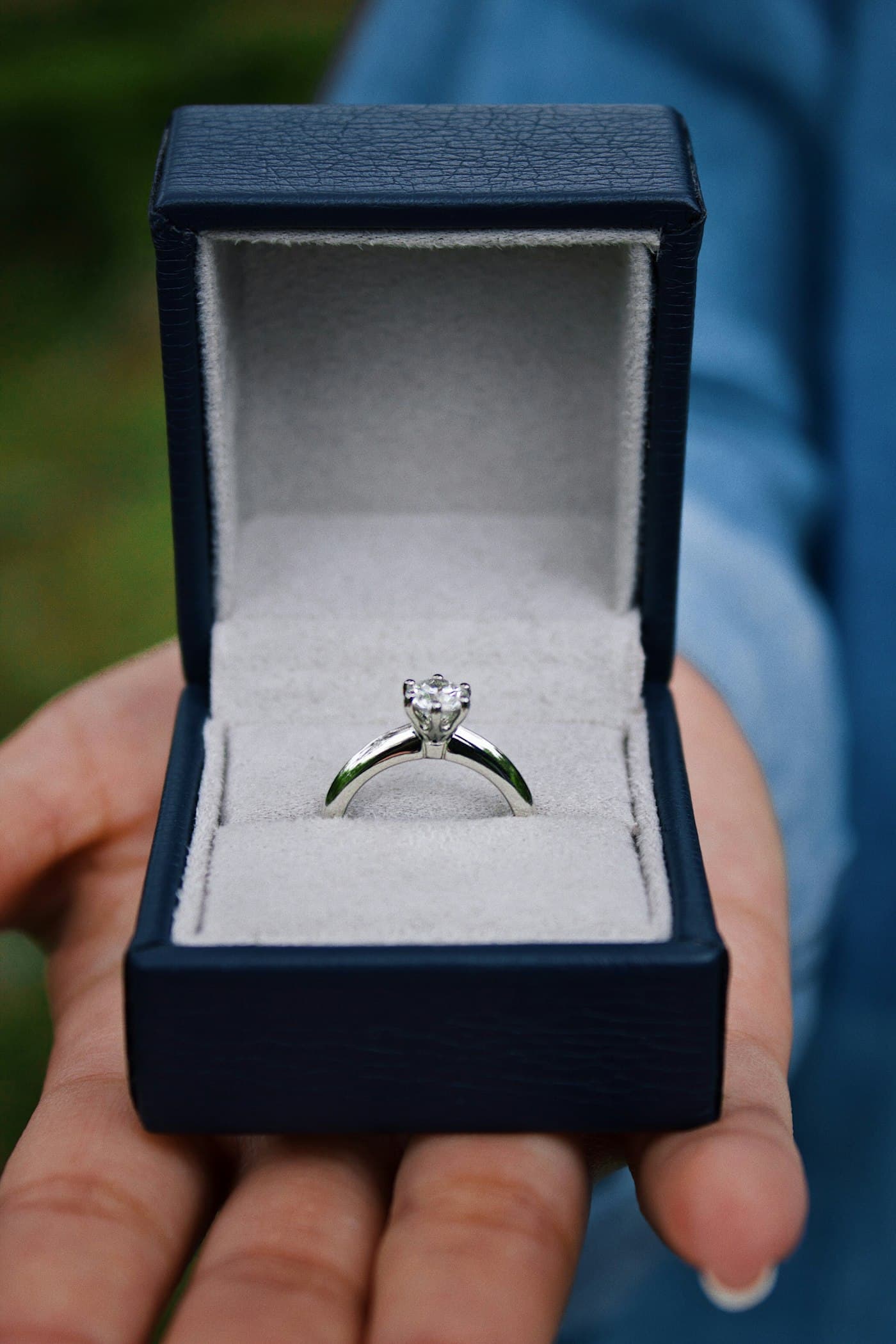 Solitaire ring in an open box